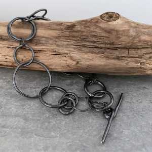 This is a picture of a blackened silver chain bracelet This is a picture of a blackened silver chain bracelet
