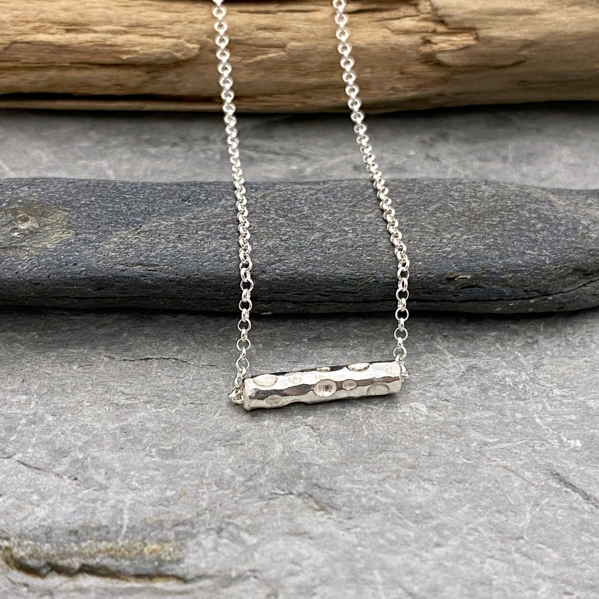 Sliding tube bubbles necklace