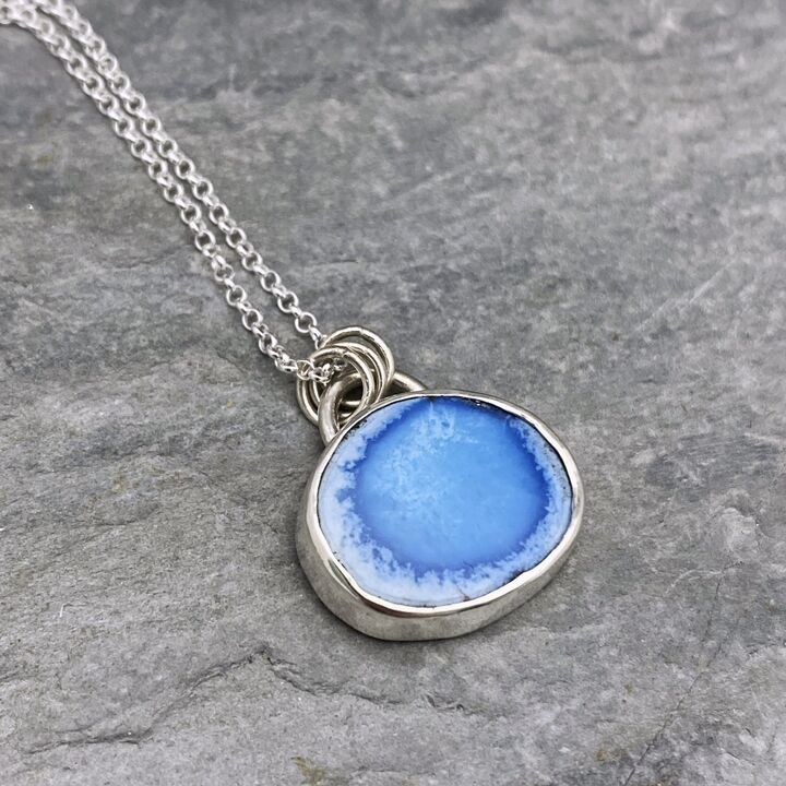 Turquoise and silver pendant.