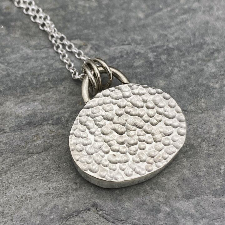 Turquoise and silver pendant. 2