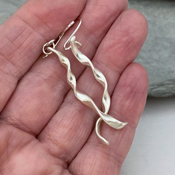 Long dangle brushed silver earrings