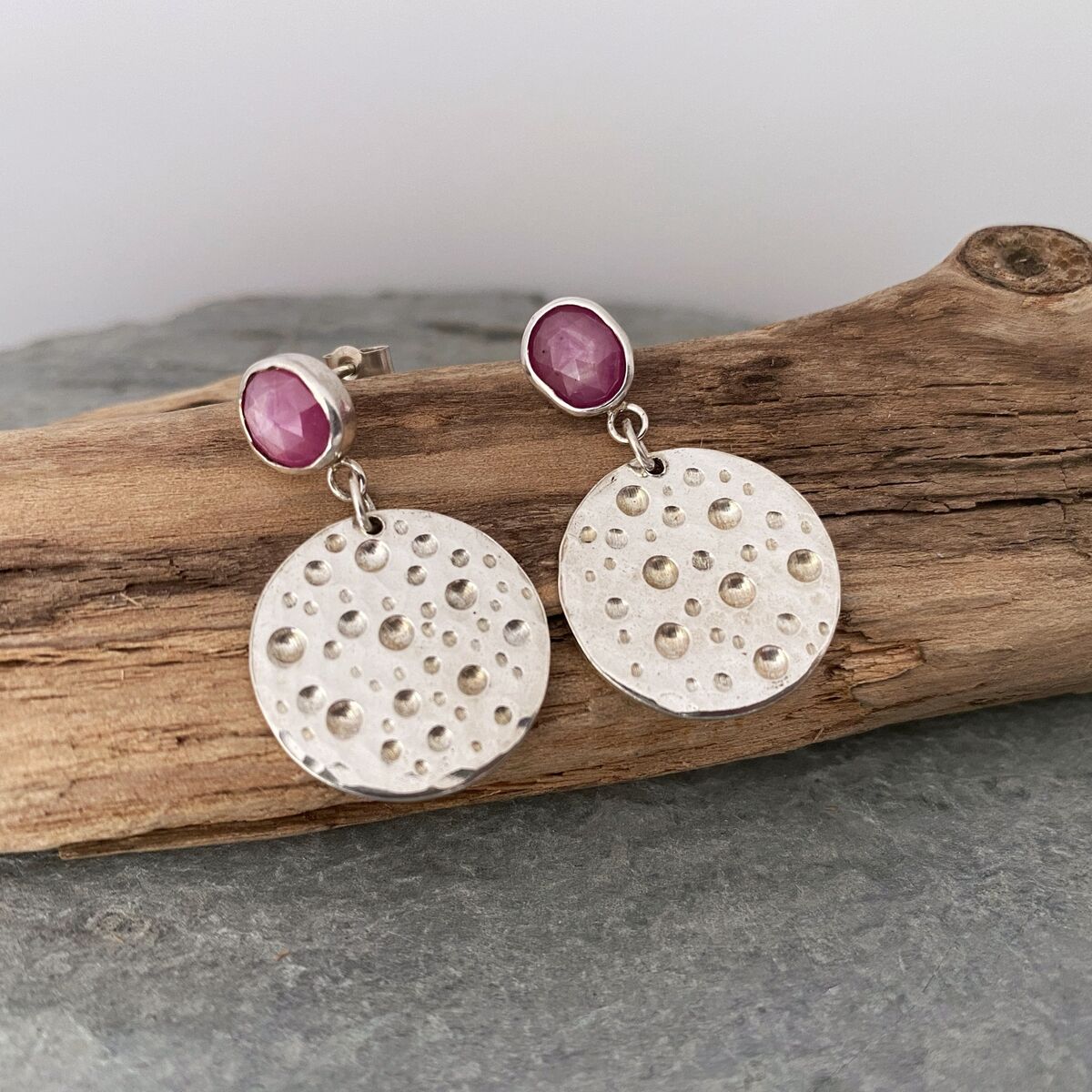 Ruby topped silver disc earrings