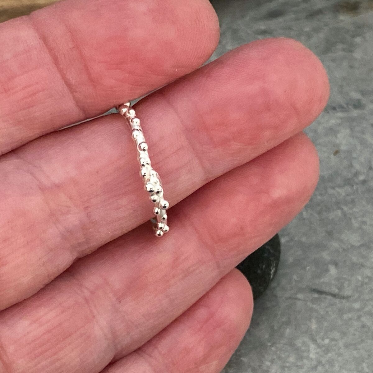 Thin silver ring band with tiny bubbles 7 Thin silver ring band with tiny bubbles 7