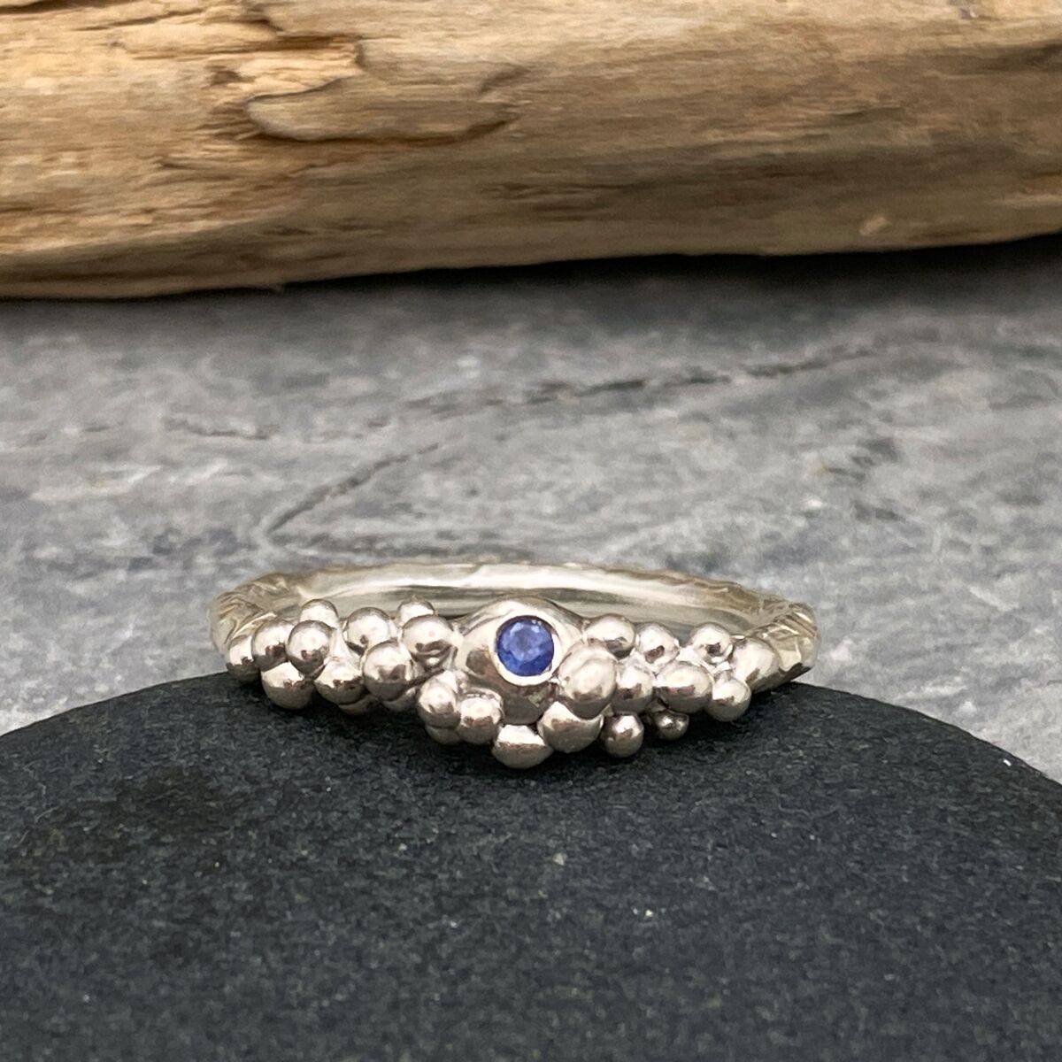 Silver bubbles ring set with a blue sapphire Silver bubbles ring set with a blue sapphire