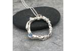 Topaz and silver circle necklace