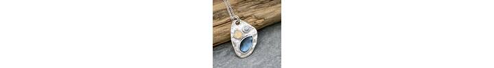 Textured reticulated silver with gemstones necklace