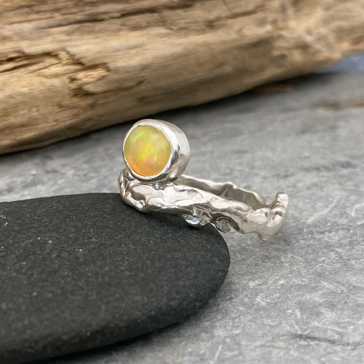 Opal and silver ring