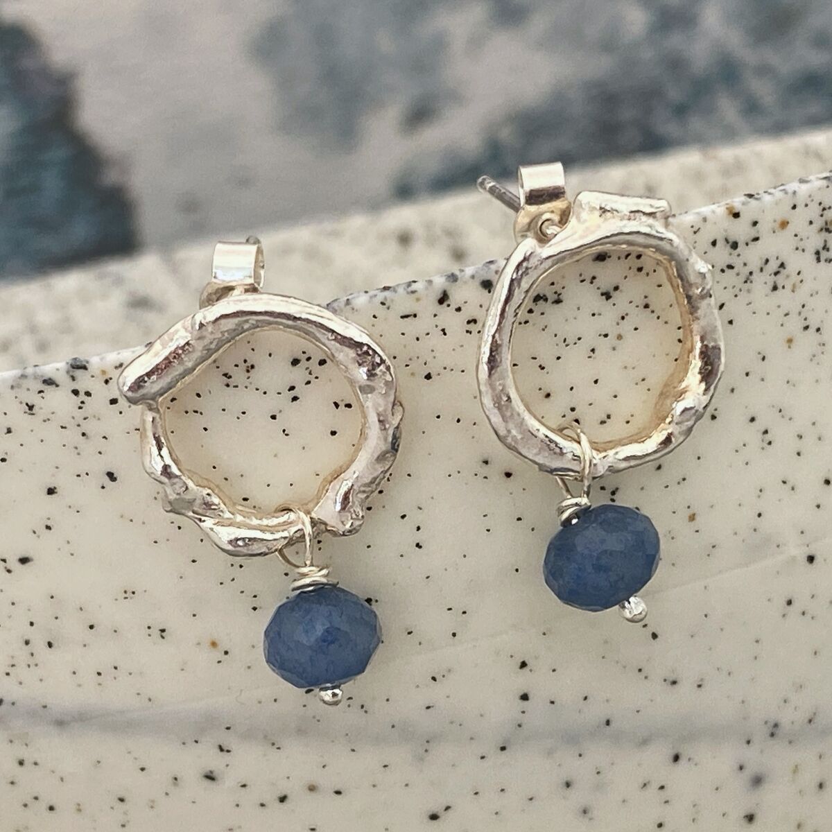 Organic silver studs with apatite beads