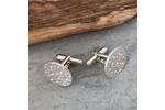 Round silver cufflinks