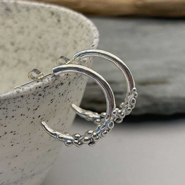 This is a picture of silver hoop earrings