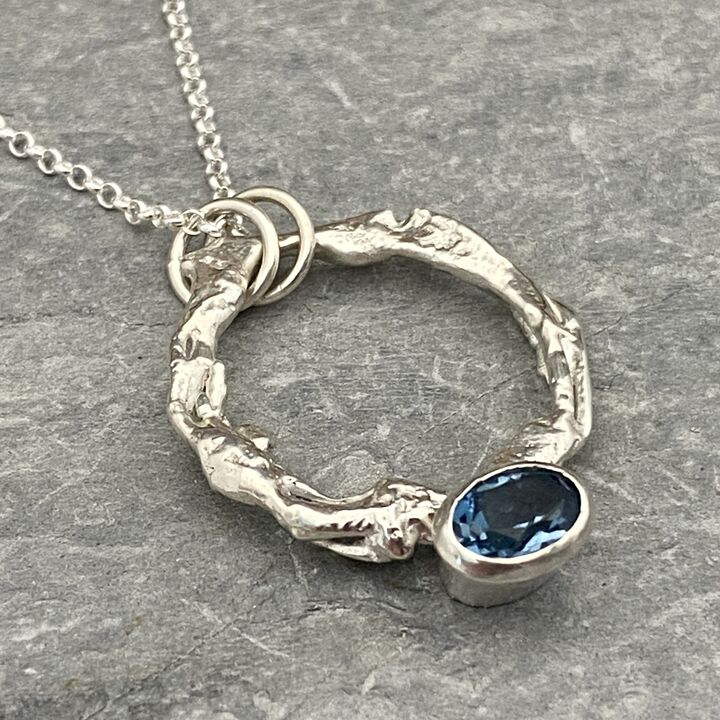 Organic silver topaz pendant