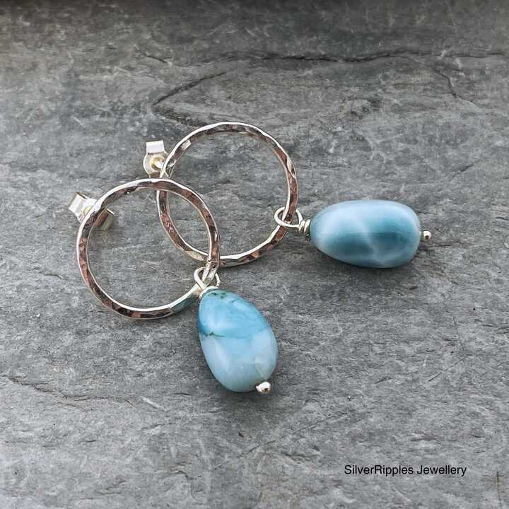 This is an image of a pair of Larimar and silver earrings