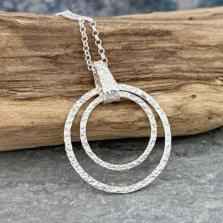 Coastline textured two circle silver pendant