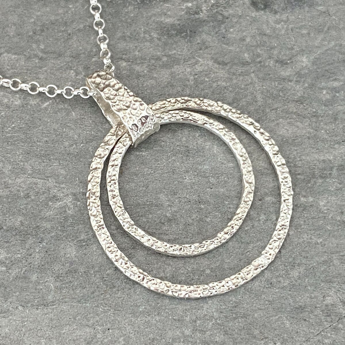 Coastline textured two circle silver pendant 2