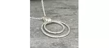 Coastline textured two circle silver pendant 3