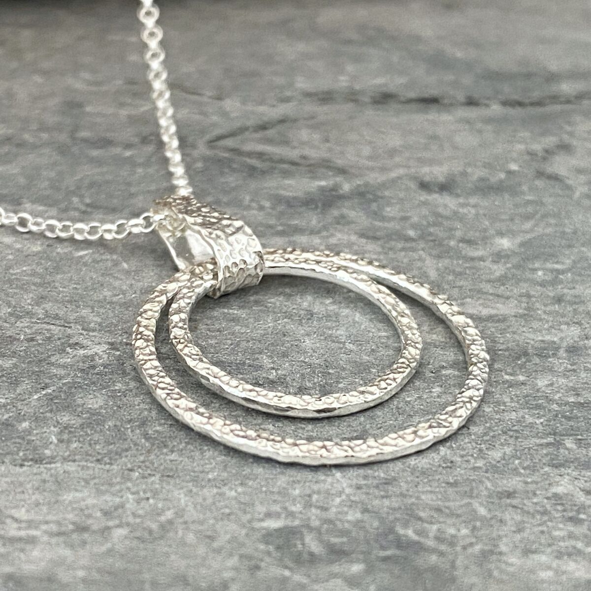 Coastline textured two circle silver pendant 3