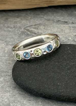 This is a picture of a pair of blue topaz earrings