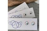 Small circle studs with Topaz stones