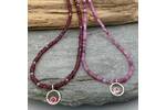 Ruby bead necklace with tiny sapphire pendant